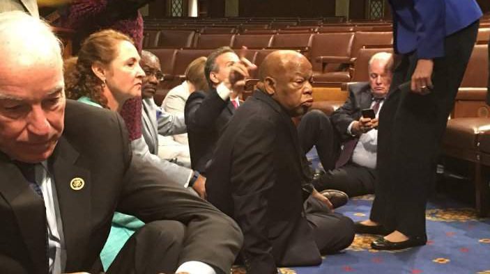 House Democrats, including, from left to right, Rep. Joe Courtne, of Connecticut, Rep. Elizabeth Esty, also of Connecticut and Rep. John Lewis, of Georgia, sit in to protest for a gun control vote. (Rep. Robin Kelly/Twitter)