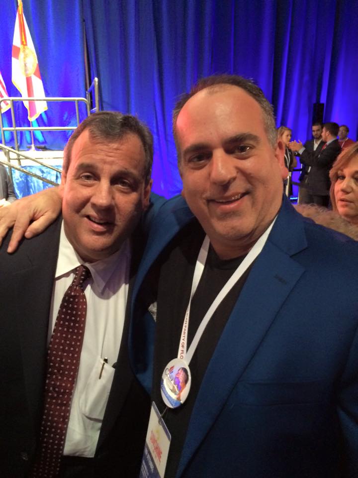 Kenneth Lewis with New Jersey Governor Chris Christie. (Facebook)