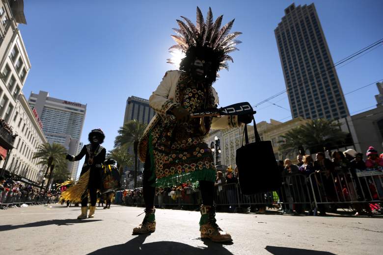 A member of the Zulu Social Aid and Pleasure Club parades down Canal Street during Mardi Gras day on February 9, 2016 in New Orleans, Louisiana. (Photo by Jonathan Bachman/Getty Images)