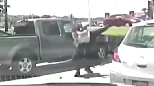 An officer arresting an Austin school teacher. Video screenshot from YouTube.