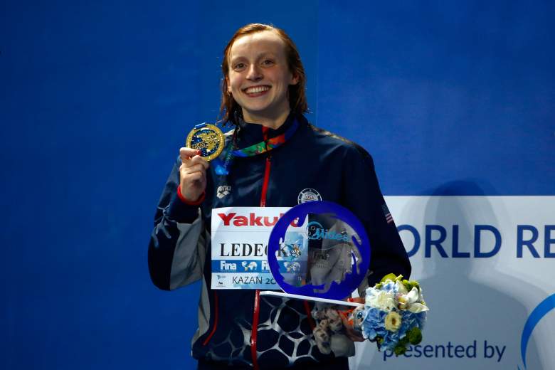 Gold medallist Katie Ledecky poses during the medal ceremony after setting a new world record of 8:07.39 in the Women's 800m Freestyle Final at the 16th FINA World Championships. (Getty)