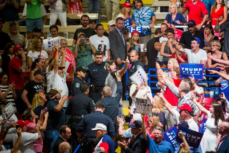 Trump Austin protester, Trump Austin protester middle finger, Trump Austin rally