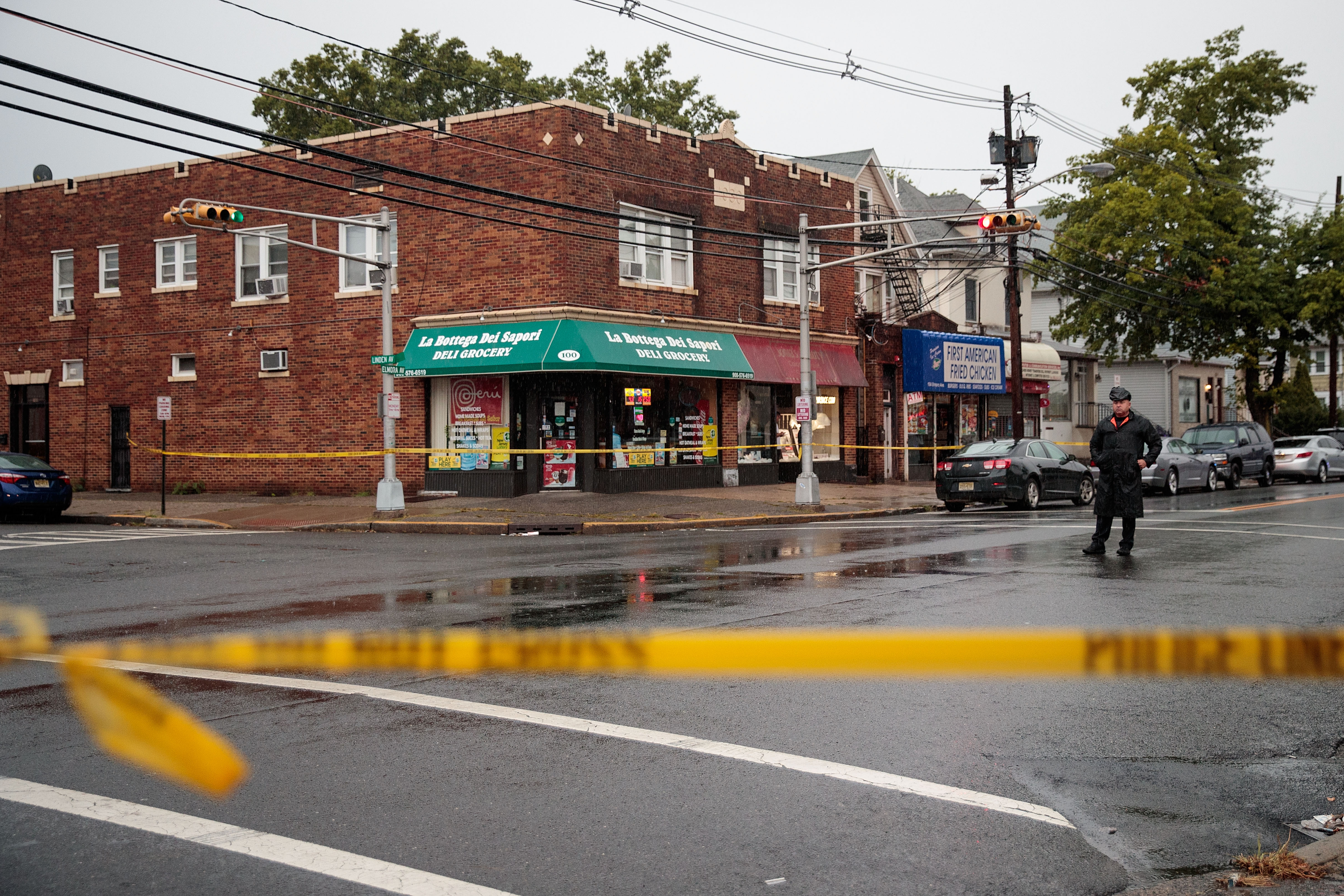 A local police officer stands guard at an intersection as members of the Federal Bureau of Investigation and other law enforcement officials investigate a residence in connection to Saturday night's bombing in Manhattan on September 19, 2016 in Elizabeth, New Jersey. (Getty)