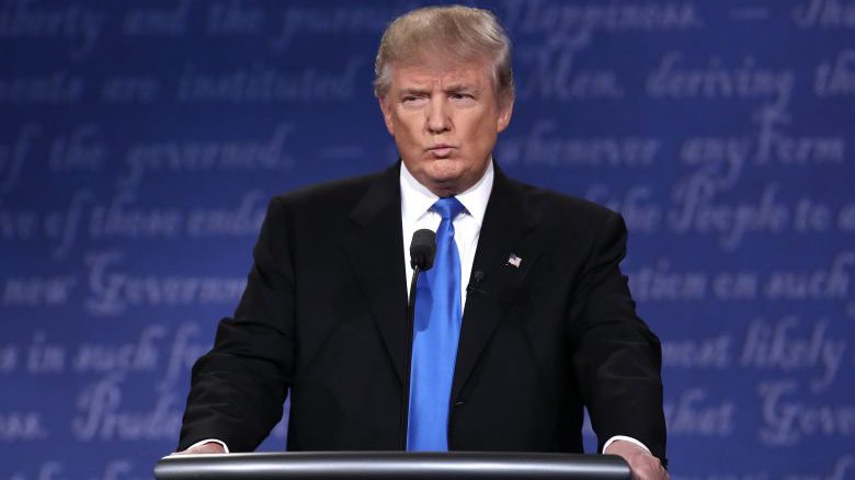 PHOTOS: Trump Looms Over Clinton During Debate