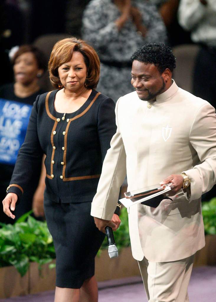 LITHONIA, GA - SEPTEMBER 26: Bishop Eddie Long walks to the pulpit with his wife Vanessa Long to give a sermon where he addressed sex scandal allegations at New Birth Missionary Baptist Church September 26, 2010 in Atlanta, Georgia. Bishop Eddie Long, the pastor of a Georgia megachurch was accused of luring young men into sexual relationships, has told his congregation of thousands that he denies all the allegations and that all people must face painful and distasteful situations. (Photo by John Amis-Pool/Getty Images)