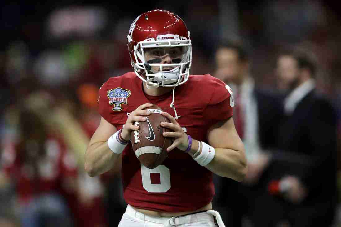 WATCH: Baker Mayfield Plants OU Flag on Ohio State Logo