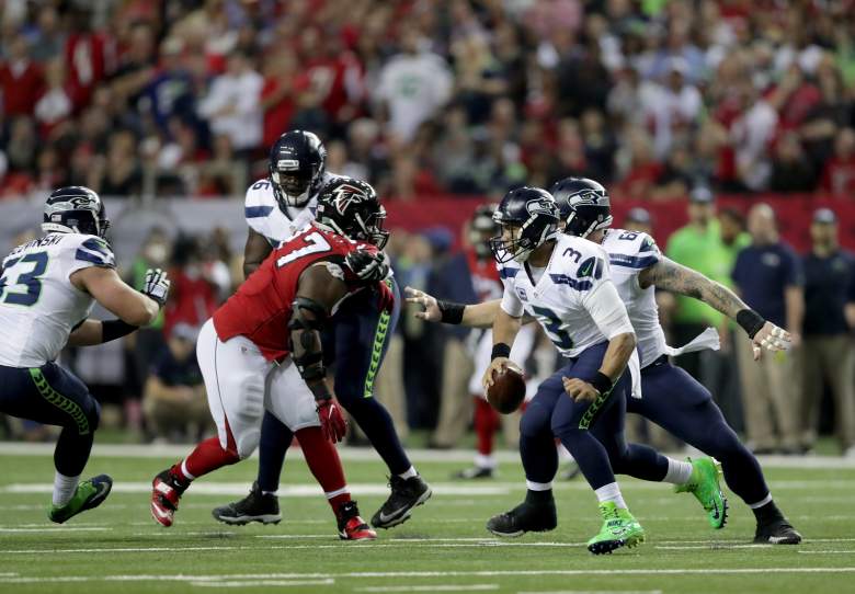 russell wilson safety,rees odhiambo steps on russell wilson,falcons safety