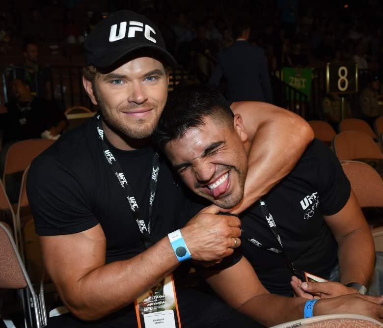 Actor Kellan Lutz, left, and Ortiz joke around as they attend a UFC event in 2014. (Getty)