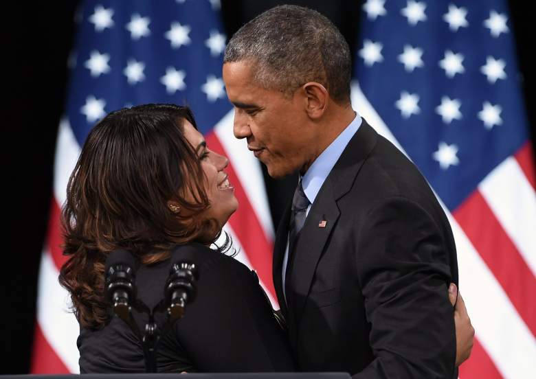 Astrid Silva hugs President Barack Obama after introducing him prior to his speech on his executive action on U.S. immigration policy at Del Sol High School on November 21, 2014. (Getty)