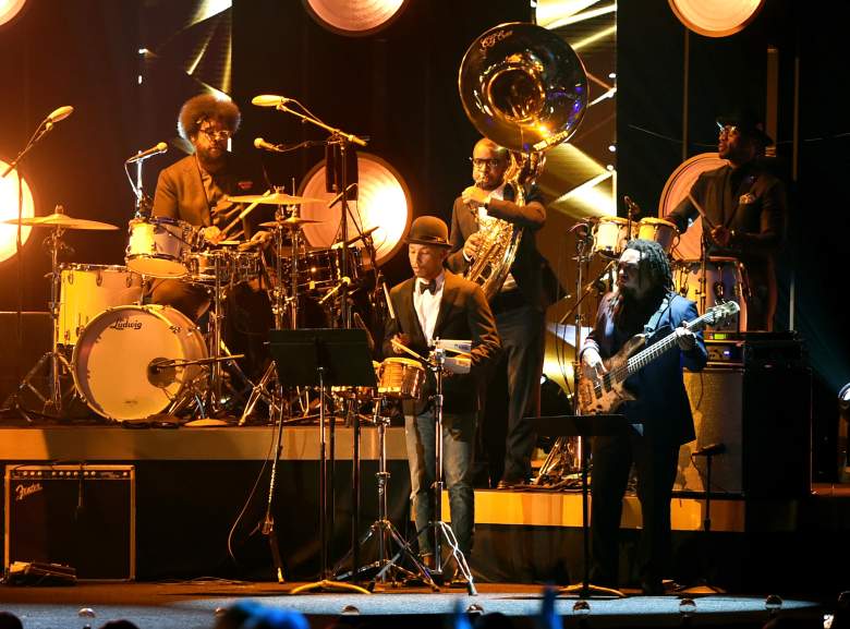 Musician Pharrell Williams, center, performs onstage with The Roots at the 2016 MusiCares Person of the Year honoring Lionel Richie February 13, 2016. (Getty)