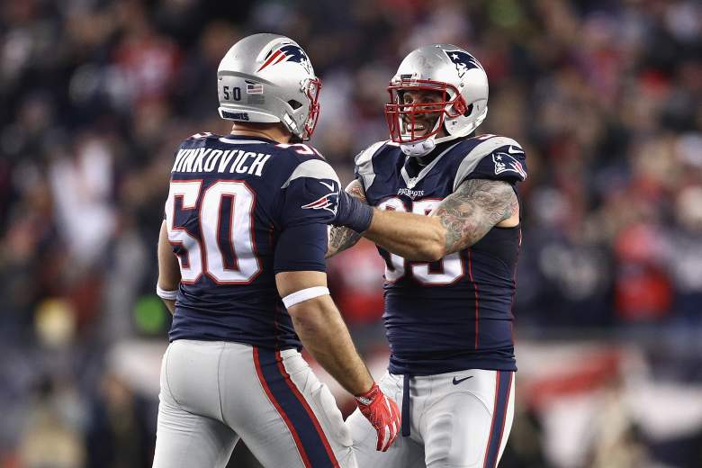 Rob Ninkovich and Chris Long  of the New England Patriots react during the second half of the game against the Baltimore Ravens at Gillette Stadium on December 12, 2016 in Foxboro, Massachusetts.  (Getty)