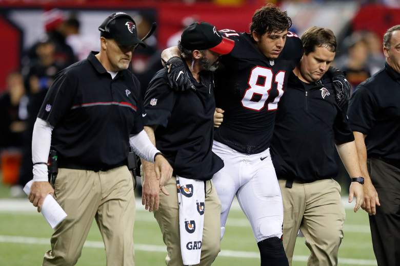 Austin Hooper injures his knee during the second half against the San Francisco 49ers at the Georgia Dome on December 18, 2016. (Getty)