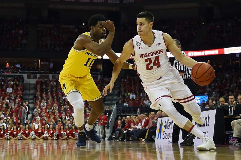 Bronson Koenig of the Wisconsin Badgers drives around Derrick Walton Jr. of the Michigan Wolverines during a game January 17. (Getty)
