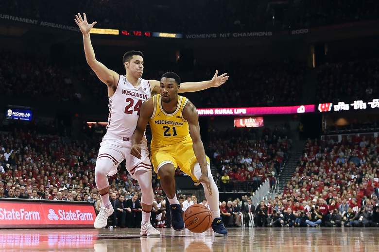 Zak Irvin of the Michigan Wolverines drives to the basket against Bronson Koenig of the Wisconsin Badgers during a game January 17. (Getty)