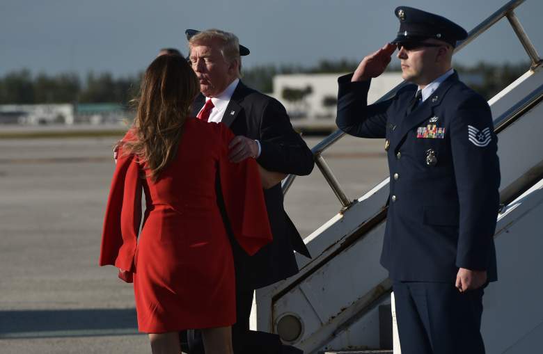 US President Donald Trump greets his wife Melania upon arrival at Palm Beach International Airport in West Palm Beach, Florida on February 3, 2017. / AFP / MANDEL NGAN        (Photo credit should read MANDEL NGAN/AFP/Getty Images)