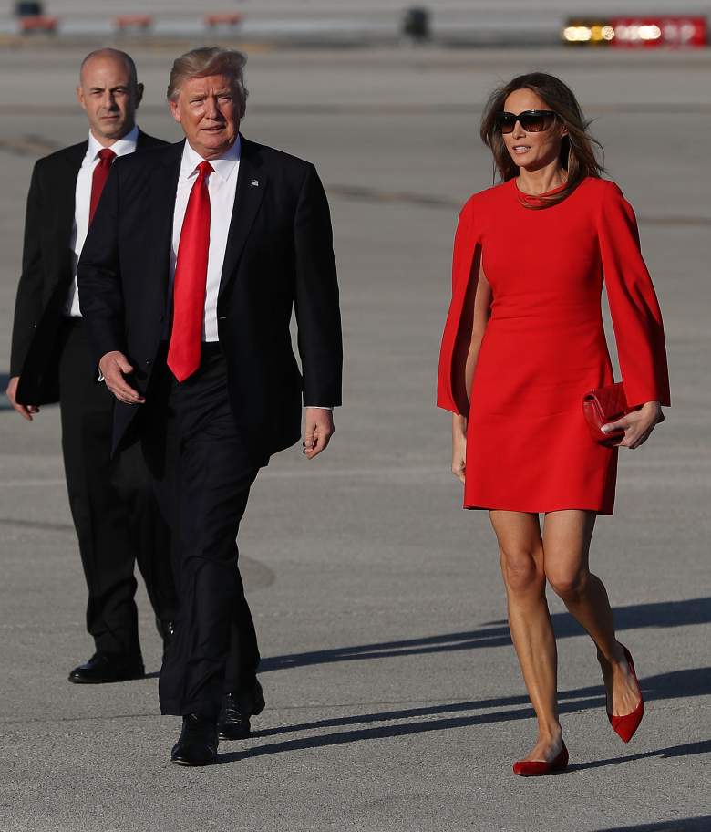 PALM BEACH, FL - FEBRUARY 03: U.S. President Donald Trump walks with his wife Melania Trump on the tarmac after he arrived on Air Force One at the Palm Beach International Airport for a visit to his Mar-a-Lago Resort for the weekend on February 3, 2017 in Palm Beach, Florida. President Donald Trump is on his his first visit to Palm Beach since his inauguration. (Photo by Joe Raedle/Getty Images)