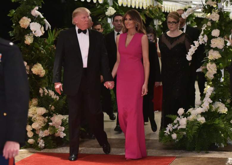 US President Donald Trump and First Lady Melania Trump arrive for the 60th Annual Red Cross Gala at his Mar-a-Lago estate in Palm Beach on February 4, 2017. / AFP / Mandel Ngan        (Photo credit should read MANDEL NGAN/AFP/Getty Images)