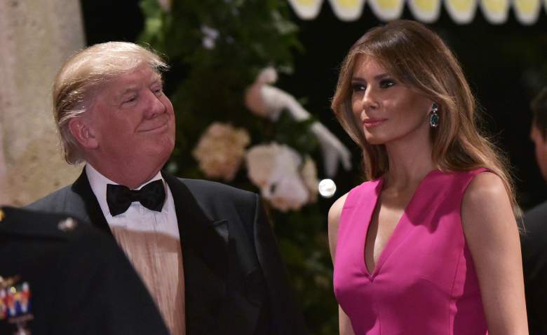 US President Donald Trump and First Lady Melania Trump arrive for the 60th Annual Red Cross Gala at his Mar-a-Lago estate in Palm Beach on February 4, 2017. / AFP / MANDEL NGAN (Photo credit should read MANDEL NGAN/AFP/Getty Images)