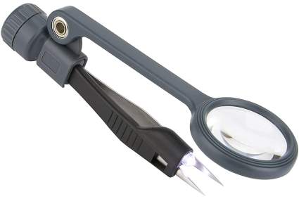 Black and grey LED tweezers with a magnifying glass