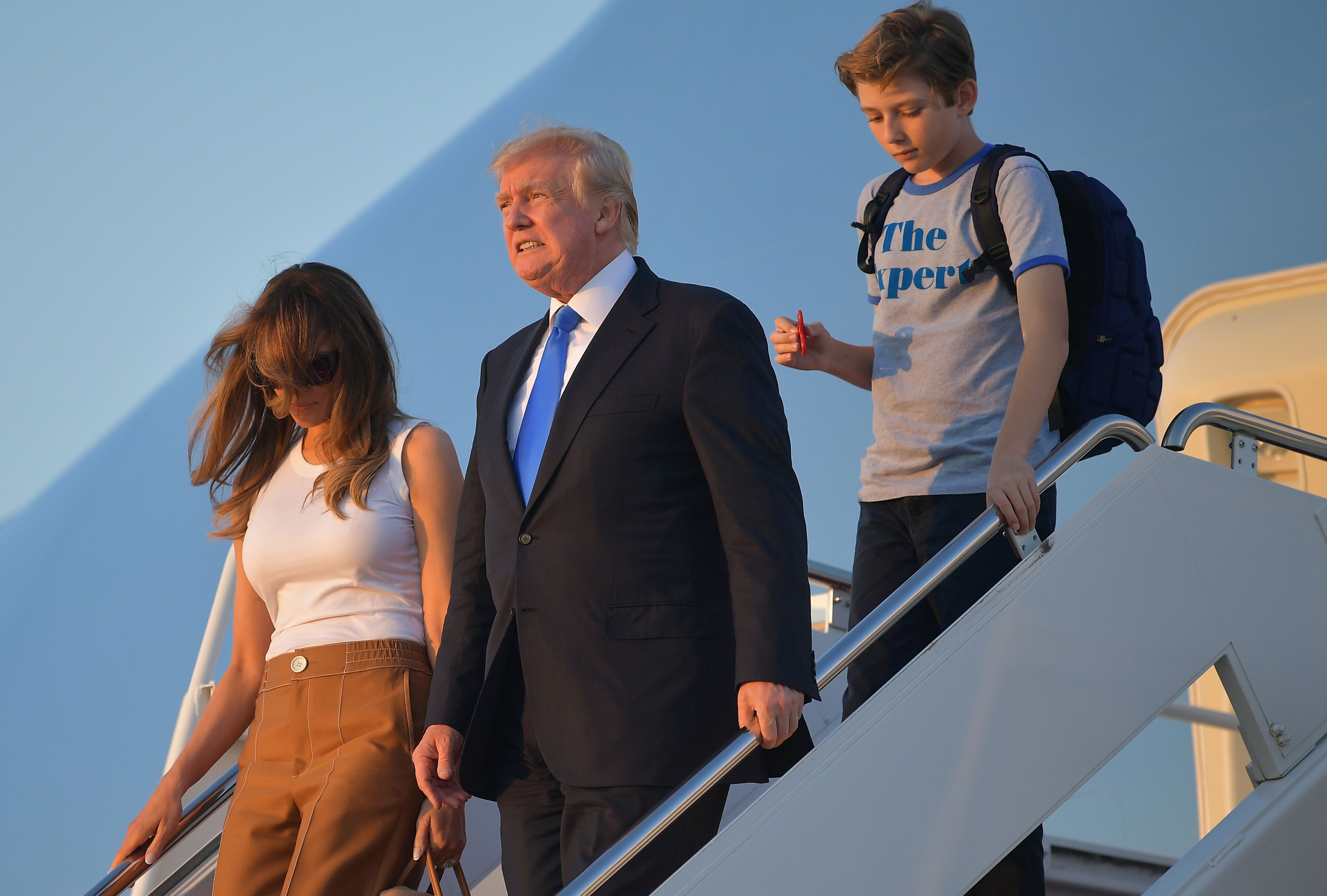 Barron Trump Carries Fidget Spinner En Route To His Home | Heavy.com