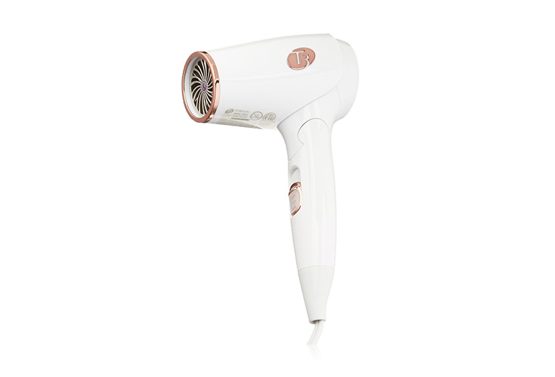 Image of white and gold folding hair dryer