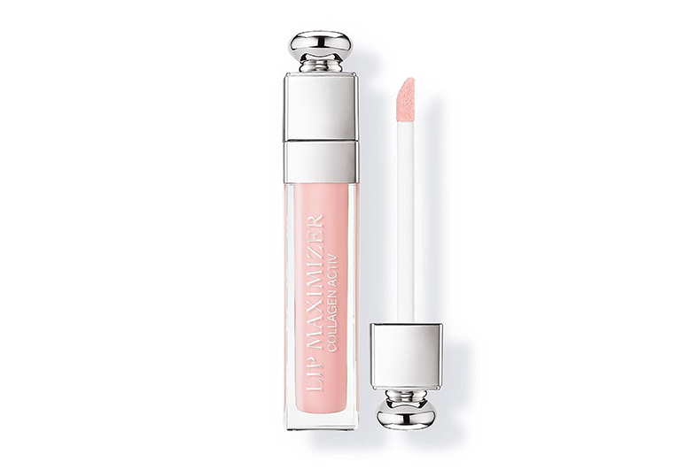 Image of light pink lip gloss with silver accents and doe foot applicator