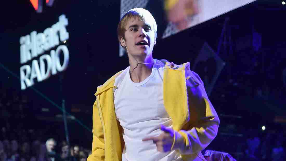 WATCH: Justin Bieber Appears to Run Over Photographer | Heavy.com