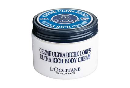 Image of white jar of loccitane body creme with black lid