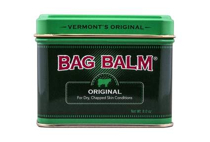 Green metal tub of bag balm