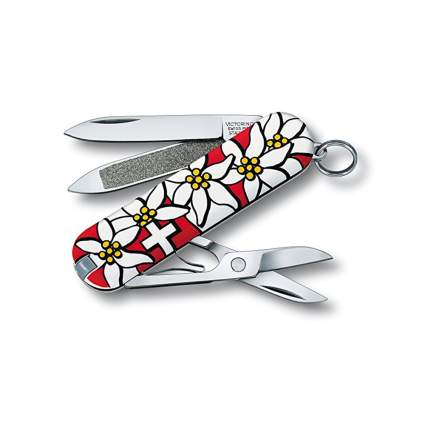 red and white flowered swiss army knife