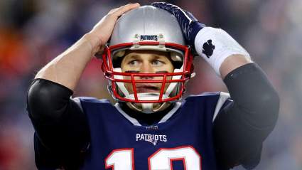 PHOTO: Tom Brady, Gisele Bundchen & a Blurry Right Hand