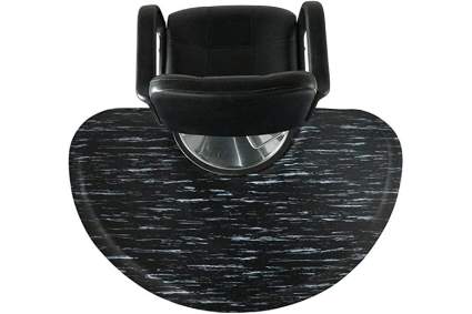 Black salon chair with marble black salon mat