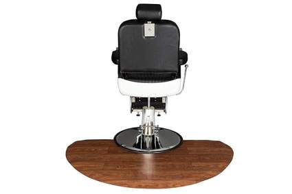 Black salon chair with faux woodgrain mat
