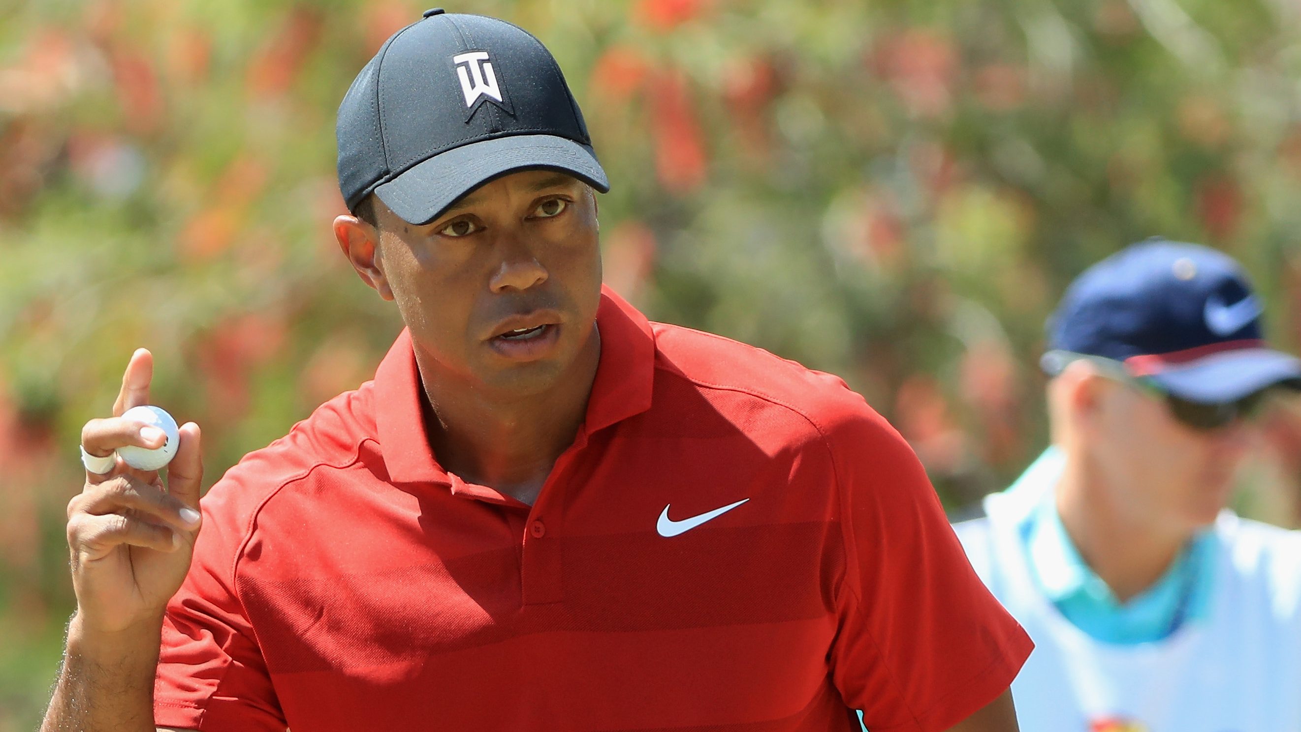 Why Does Tiger Woods Wear Red on Sundays?