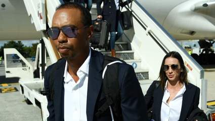 Tiger Woods & Girlfriend Erica Herman Wear Matching Pantsuits in Paris