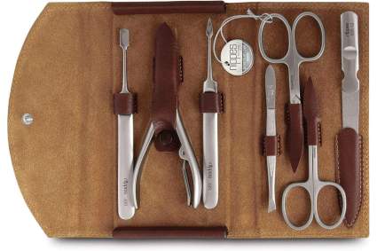 steel manicure tools in leather case