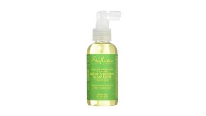 Light green bottle of hair conditioning oil