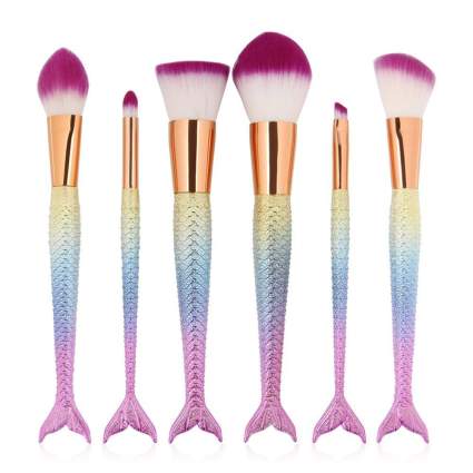 colorful makeup brushes with mermaid tails