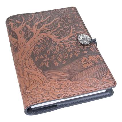 leather journal with tree carving