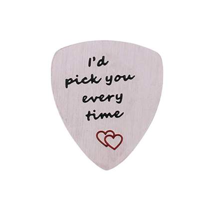 Engraved stainless steel guitar pick
