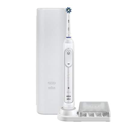 White electric toothbrush with base and case