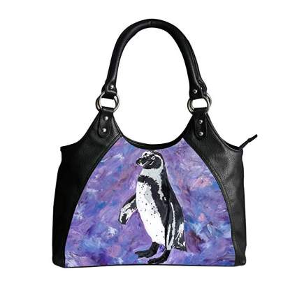 Purple purse with penguin on it