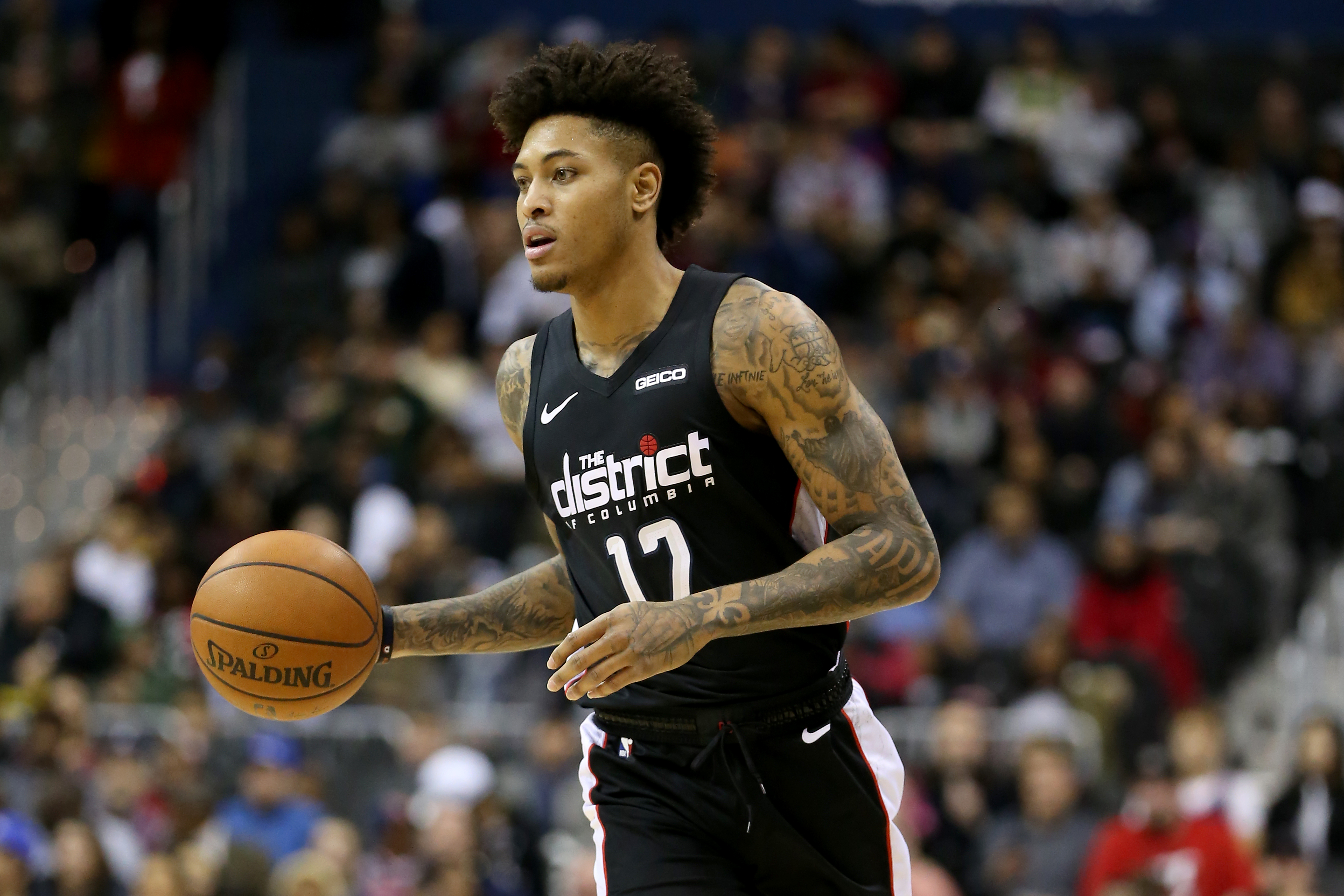 Wizards trade Kelly Oubre, Austin Rivers to Suns for Trevor Ariza