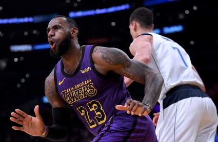 Watch: LeBron Gifts Ball Girl and Fan with Game-Worn Shoes