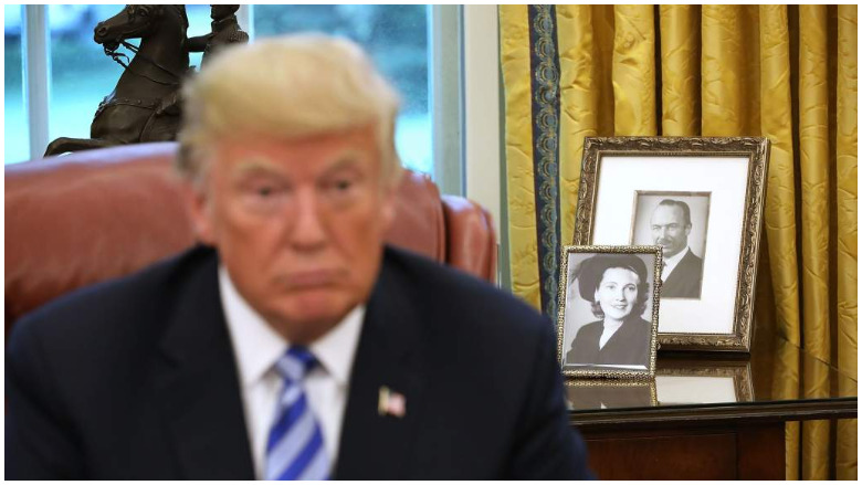 who is in photos behind trump