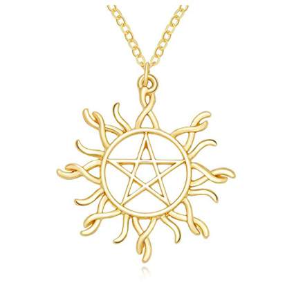 Gold sunbust with pentacle