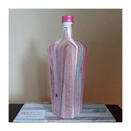 purple and pink painted glass bottle