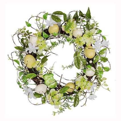 yellow easter eggs and greens door wreath