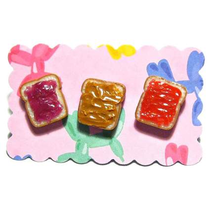 Tiny clay slices of bread with peanut butter and jelly