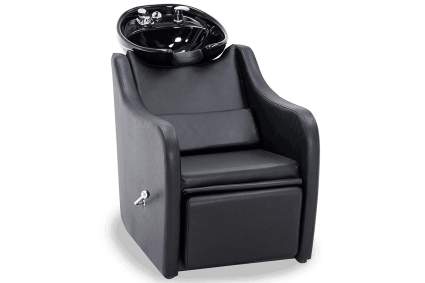 Black reclined shampoo chair